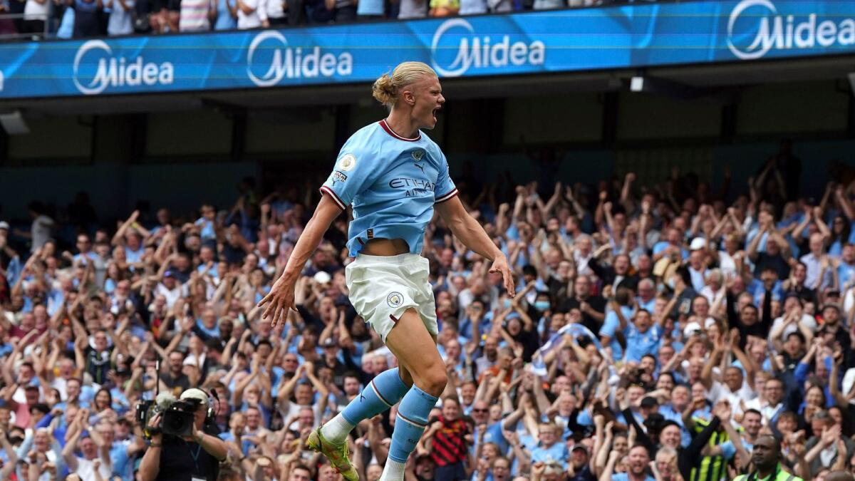 Manchester City's Erling Haaland celebrates after scoring his side's fourth goal. (AP)