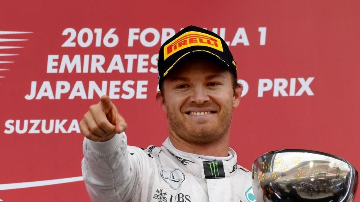Rosberg puts pressure on Hamilton with Japan win