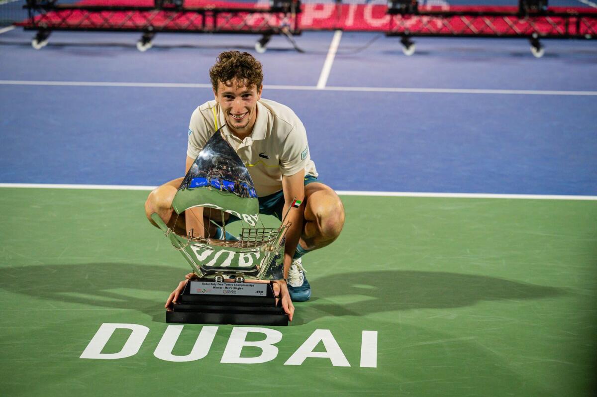Ugo Humbert poses with the trophy after winning the Dubai Duty Free Tennis Championships final against Alexander Bublik. — Photos by Neeraj Murali