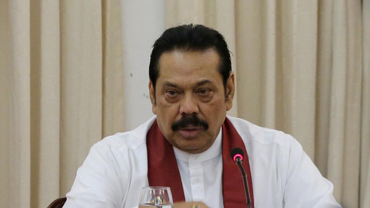 Rajapaksa set to quit as Sri Lankas premier to end crisis