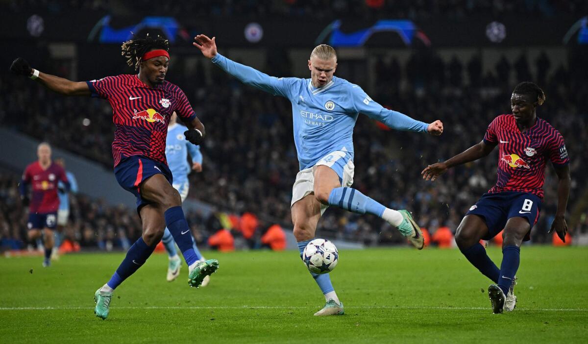 Manchester City's Norwegian striker Erling Haaland (centre) attempts a shot at goal during the match against RG Leipzig. — AFP