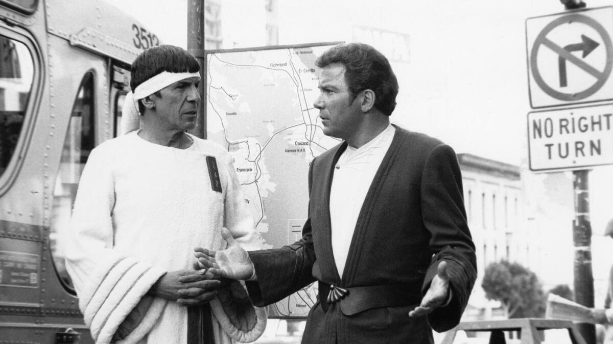 Leonard Nimoy (left) and William Shatner talk in a scene from Star Trek IV: The Voyage Home, which was directed by Nimoy