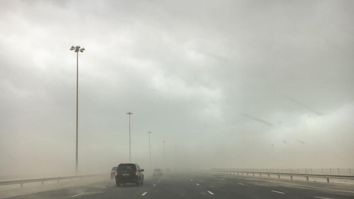 Motorist drives at the dusty road in Sheikh Khalifa Bin Zayed Highway, Yas Island Abu Dhabi. Photo By Ryan Lim