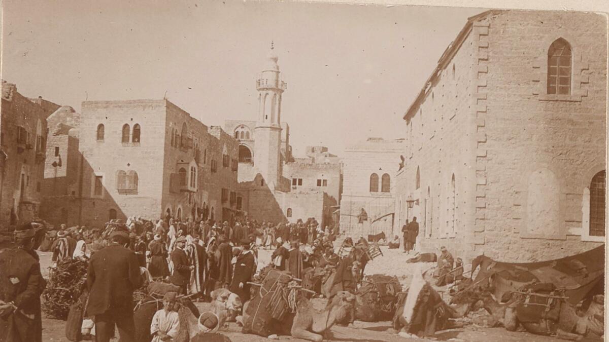A caravan's arrival at Bethlehem, Palestine (1898)