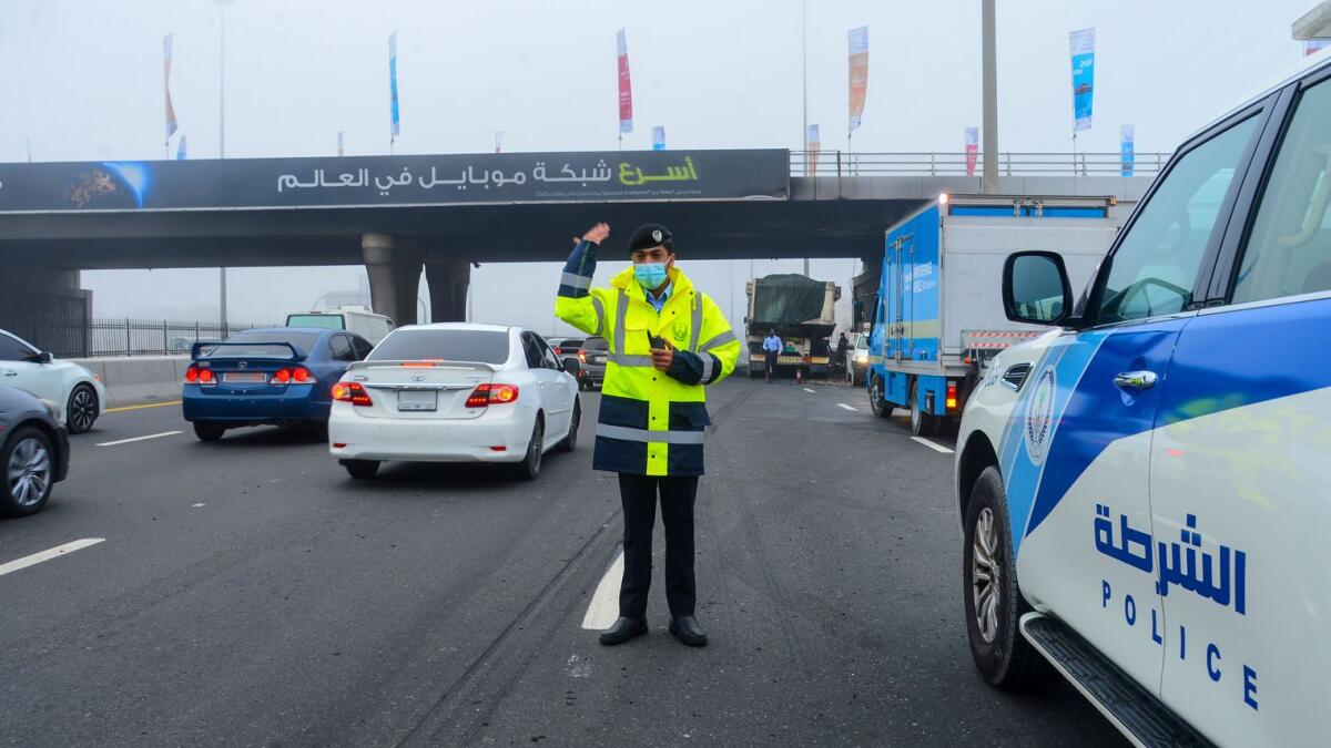 Traffic patrols in Sharjah ensured motorists' safety amid foggy weather conditions on Tuesday. — Supplied photo