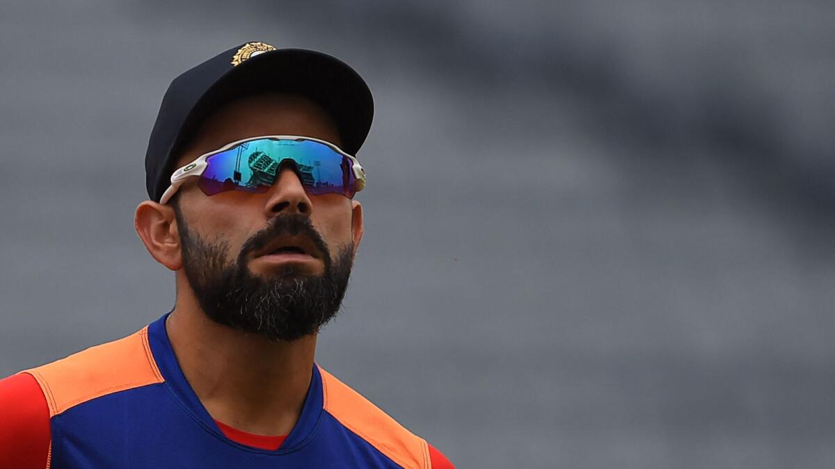 Virat Kohli will still captain India in the Tests in South Africa. — AFP file