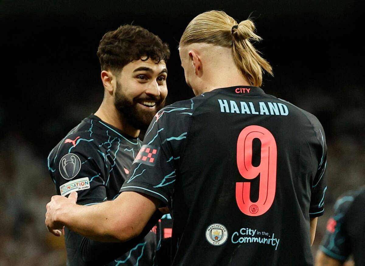 Manchester City's Josko Gvardiol celebrates scoring their third goal with Erling Braut Haaland. — Reuters