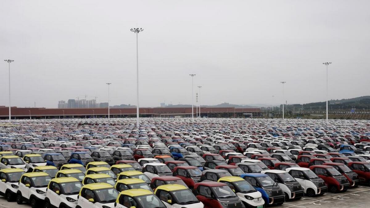 China, electric car quotas, delay emission rules