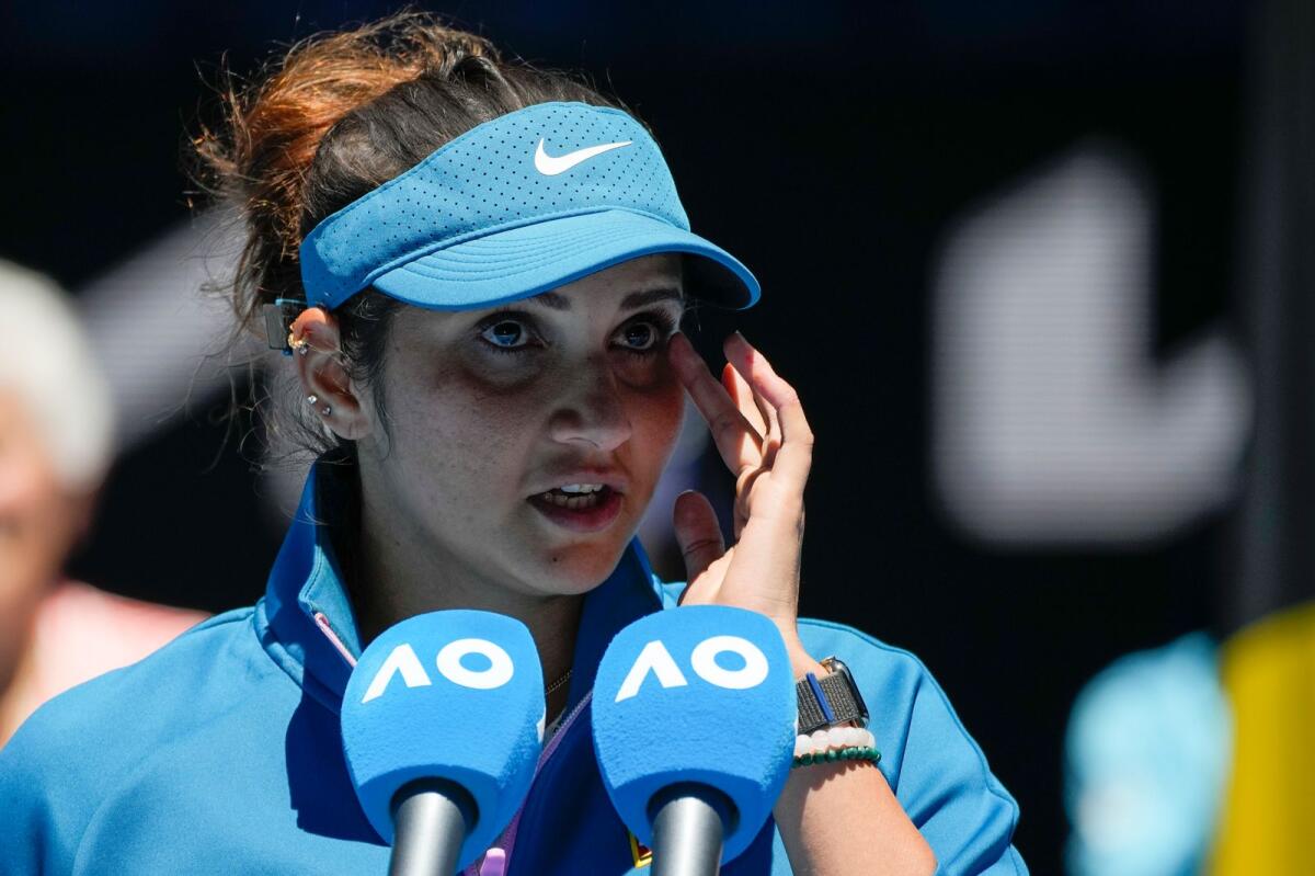 India's Sania Mirza addresses the audience following her mixed doubles final loss with partner Rohan Bopanna to Brazil's Luisa Stefani and Rafael Matos at the Australian Open. — AP