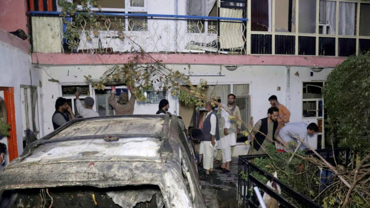A vehicle destroyed in a bomb attack by US forces in Kabul in August that killed 10 civilians. — AP file