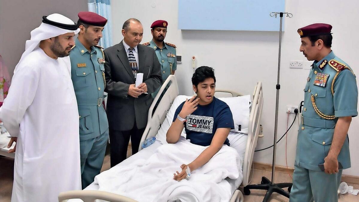 The crisis management team, constituted by the Ajman Crown Prince, visits a patient affected by water contamination in the emirate. — Supplied photo