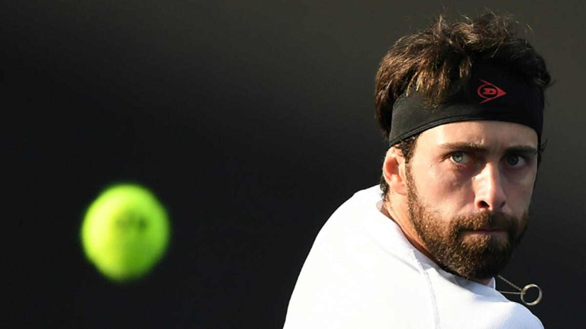 Georgia tennis star Nikoloz Basilashvili could face up to three years behind bars if found guilty. -- AFP file