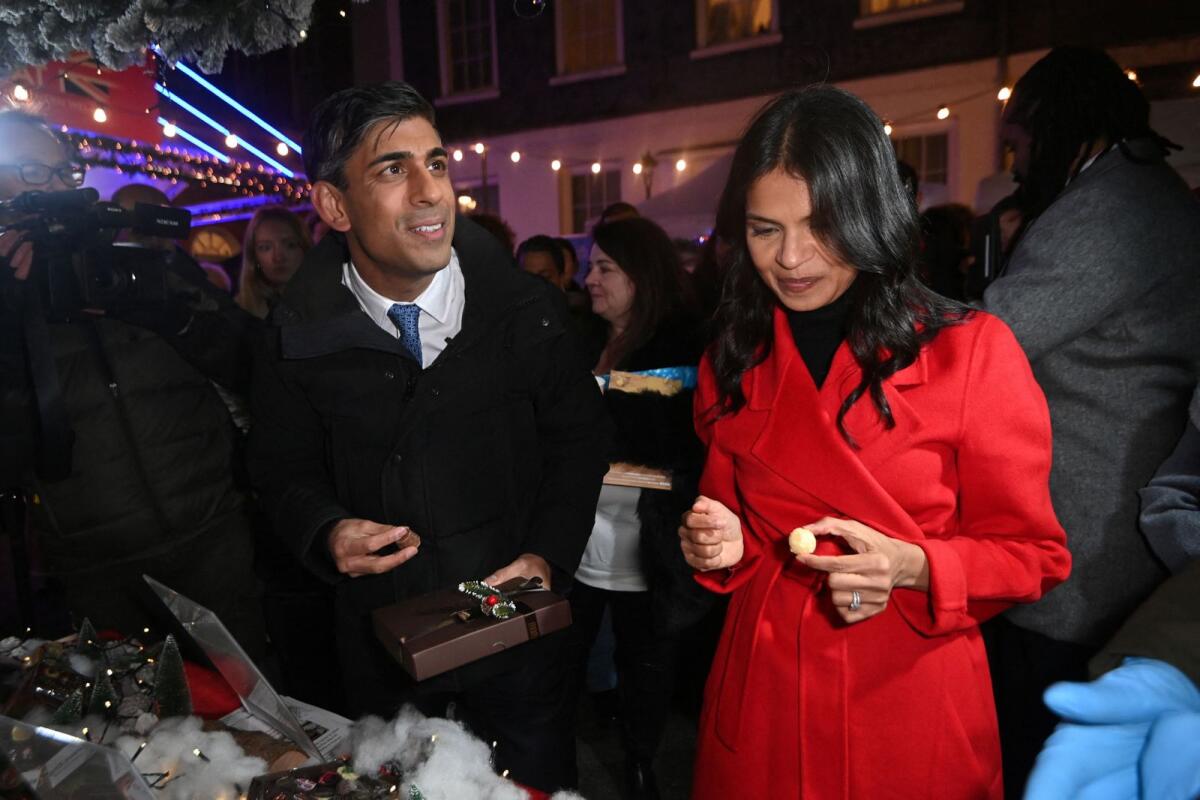 Britain's Prime Minister, Rishi Sunak, and his wife Akshata Murty prepare to switch on the Christmas tree lights at Downing Street in London, Britain, on November 30, 2023. — Reuters file
