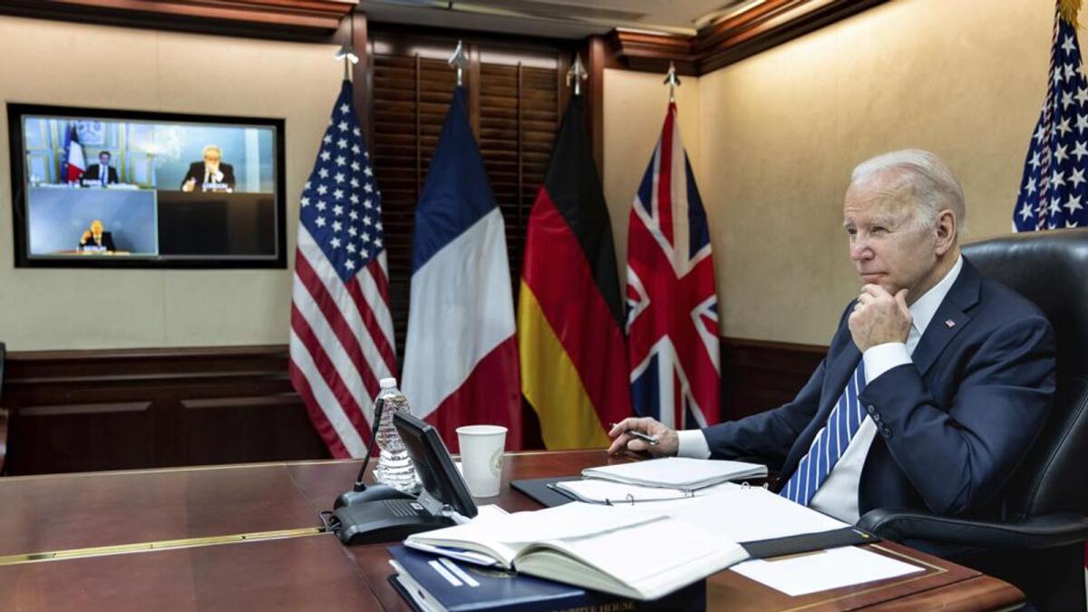 In this image provided by the White House, President Joe Biden listens during a secure video call with French President Emmanuel Macron, German Chancellor Olaf Scholz and British Prime Minister Boris Johnson in the Situation Room at the White House Monday, March 7, 2022, in Washington. Photo: AP