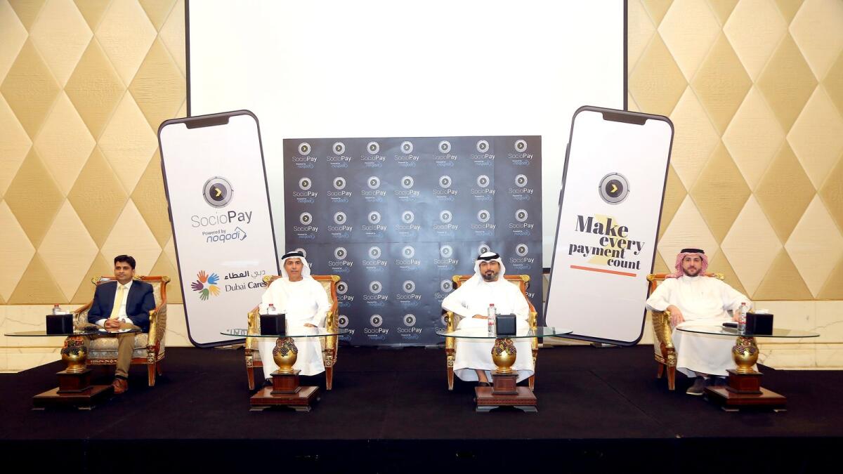 Shravan Charya, CEO &amp; Founder of SocioPay, Thani AlZaffin - CEO of Emaratech Group, Abdullah AlShehhi, COO of Dubai Cares and Ali AlZayar, Board Member of SocioPay. Supplied photo