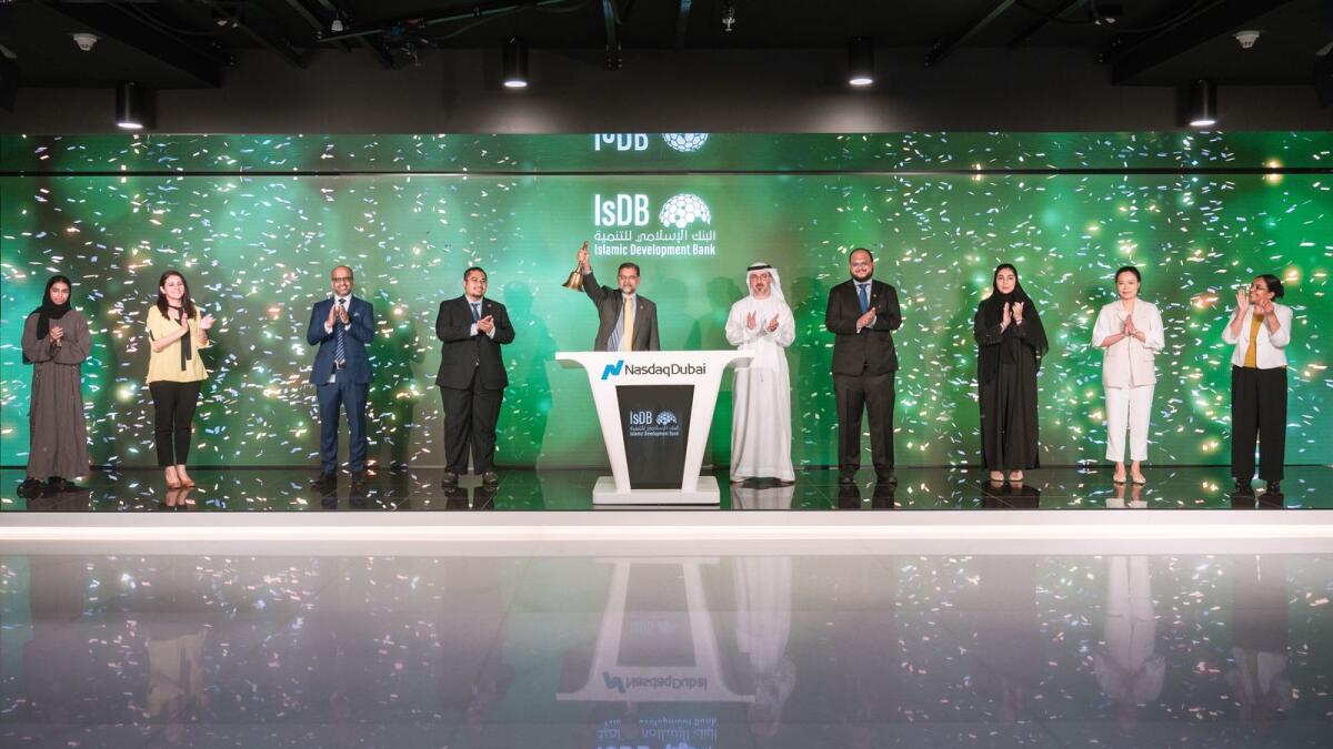 Dr Zamir Iqbal ringing Nasdaq Dubai’s market-opening bell to celebrate the listing of a $1.7 billion sukuk on the exchange. — Supplied photo