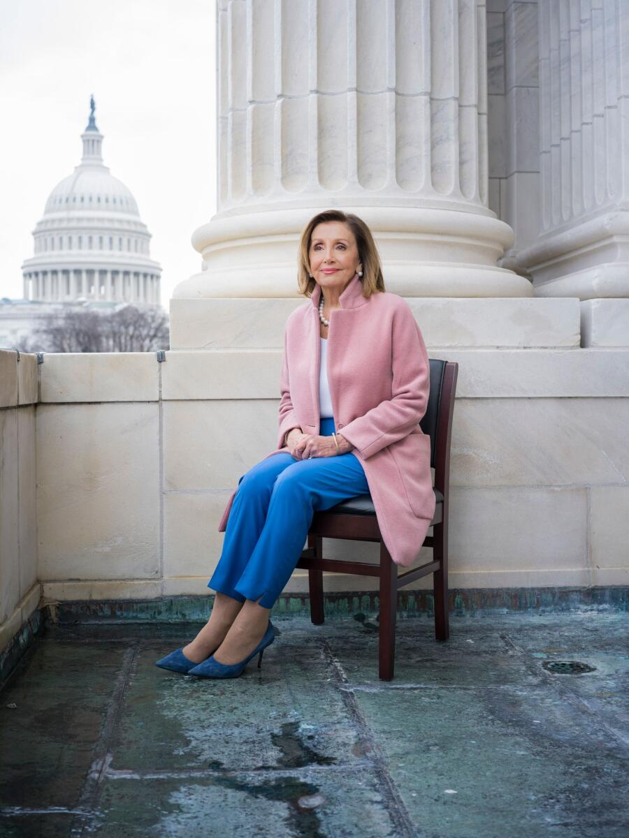 Nancy Pelosi on a balcony of the Canon House Office Building on Capitol Hill in Washington on January 17, 2023. “It’s just the time, and that’s it. Upward and onward,” Pelosi said of the end of her leadership role. (Damon Winter/The New York Times)