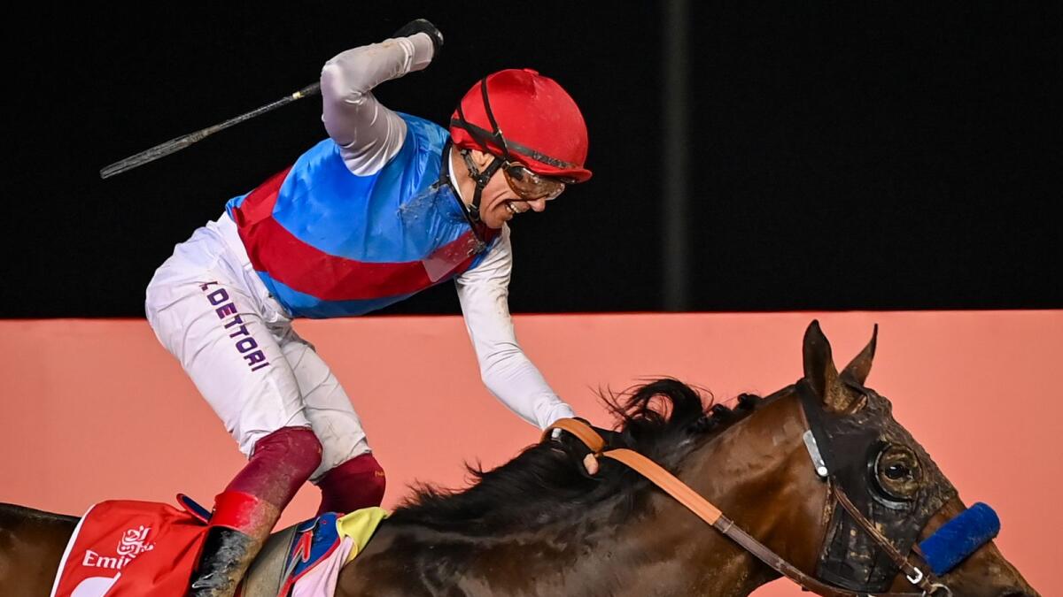 Frankie Dettori rides Country Grammer to victory in the $12 million Dubai World Cup at Meydan. — M. Sajjad