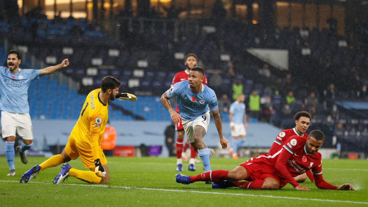 Manchester City's Gabriel Jesus celebrates after scoring a goal against Liverpool. — Reuters