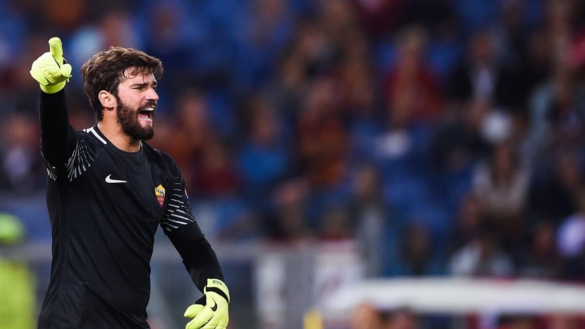 Alisson stars as Roma hold Atletico