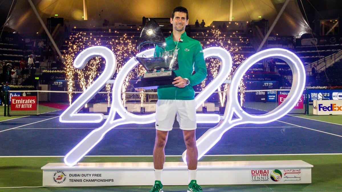 Novak Djokovic celebrates with the trophy after winning the 2020 Dubai Duty Free Tennis Championships. (Supplied photo)