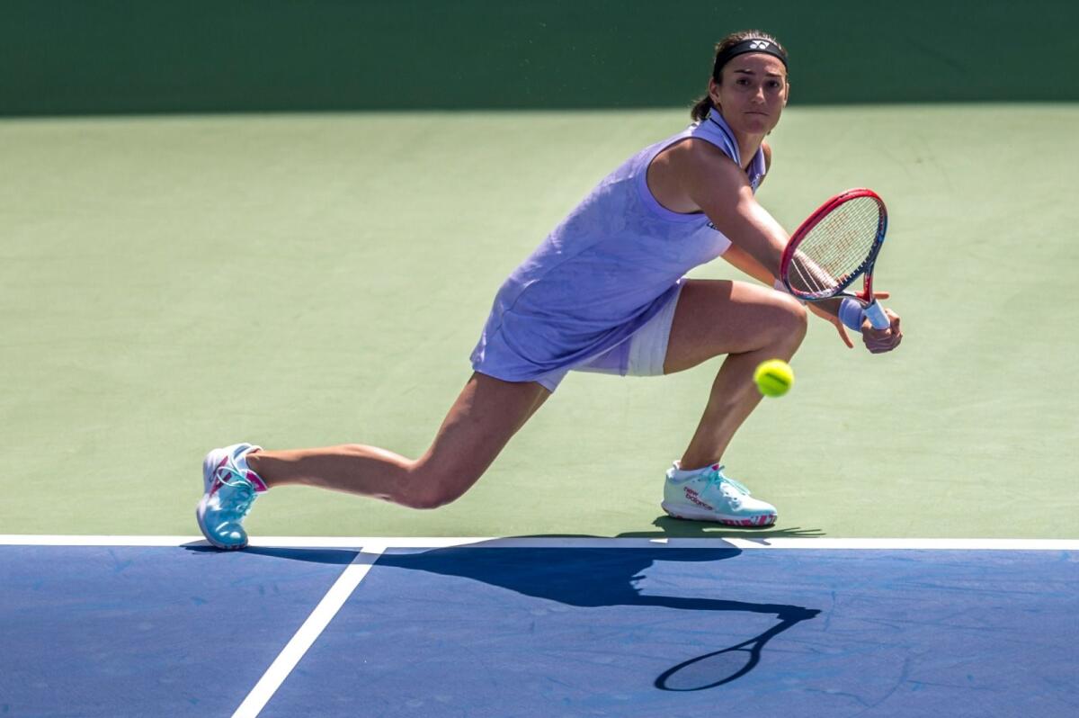 Caroline Garcia hits a return during her match in Dubai on Tuesday. — Photo by Shihab