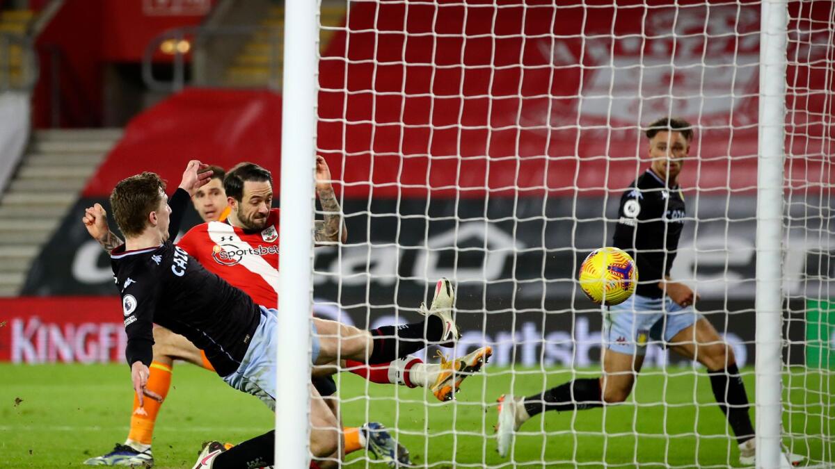 Southampton's Danny Ings (centre) scores a goal against Aston Villa. — AP