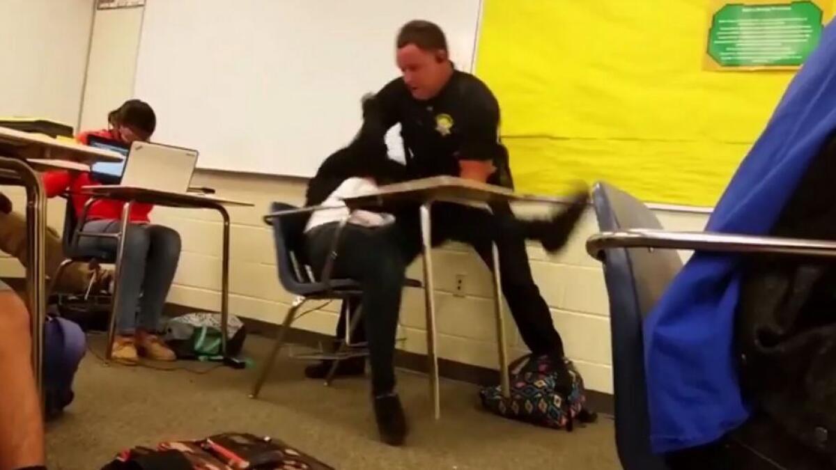 Video of US policeman caught beating student sparks outrage
