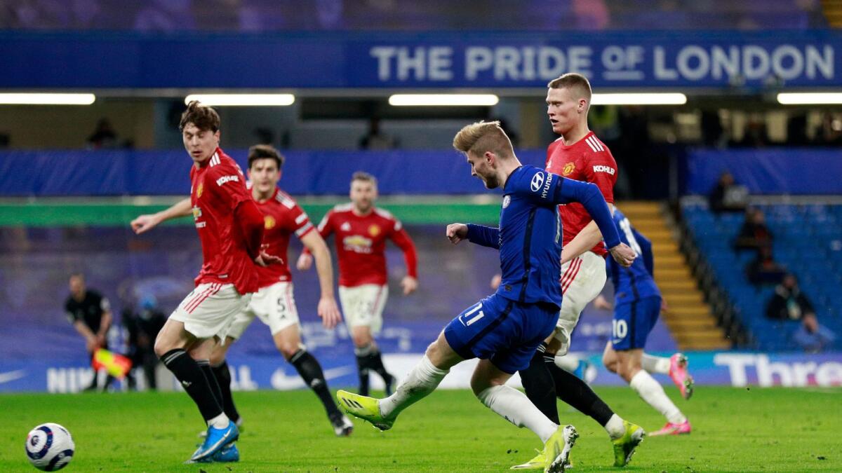 Chelsea's Timo Werner (centre) has an unsuccessful shot during the English Premier League match against Manchester United at Stamford Bridge. — AFP
