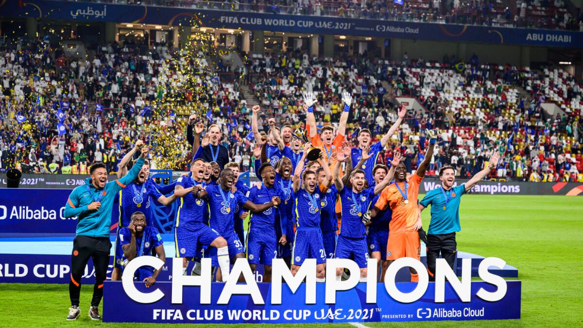 Chelsea players celebrate with the Fifa Club World Cup trophy after defeating Brazilian side Palmeiras in the final, in Abu Dhabi on Saturday. — Neeraj Murali