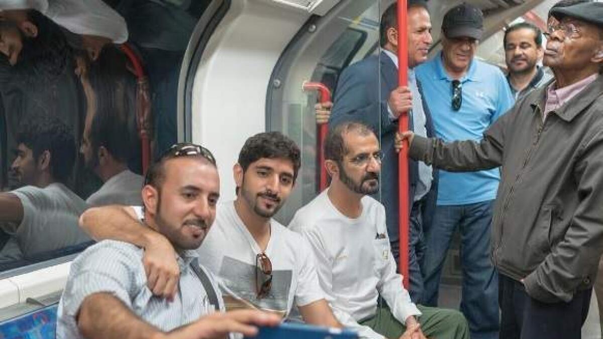 Shaikh Mohammed, son ride London Underground