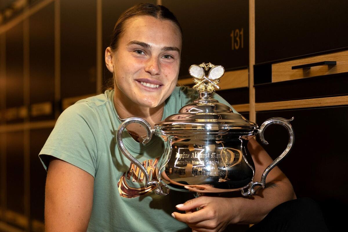 Aryna Sabalenka poses with the 2023 Australian Open women's singles trophy. - AFP File
