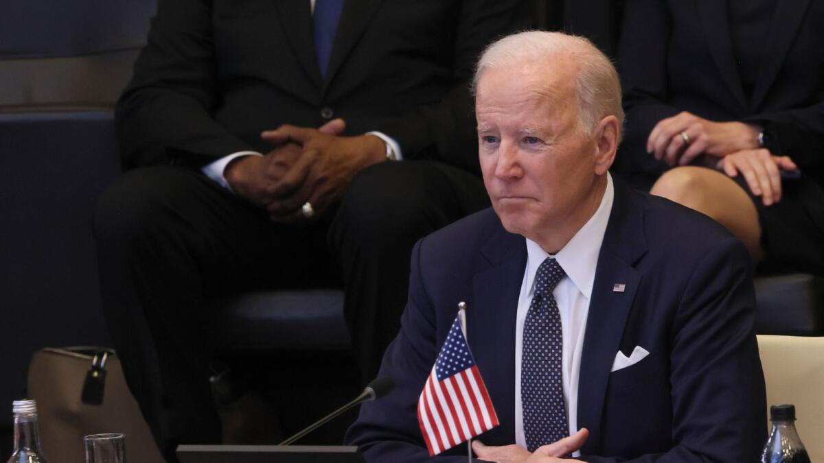 U.S. President Joe Biden looks on as he attends a North Atlantic Council meeting during a NATO summit at NATO Headquarters in Brussels on March 24, 2022. Photo: AFP