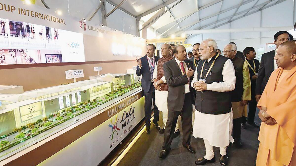 Prime Minister Narendra Modi being briefed about the upcoming LuLu Mall in Lucknow by Lulu Group Chairman Yusuffali MA.