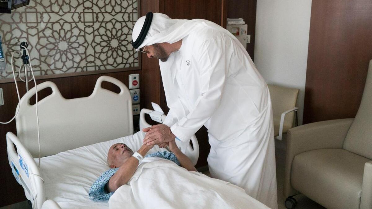 Sheikh Mohamed visits ailing Indian employee in UAE hospital