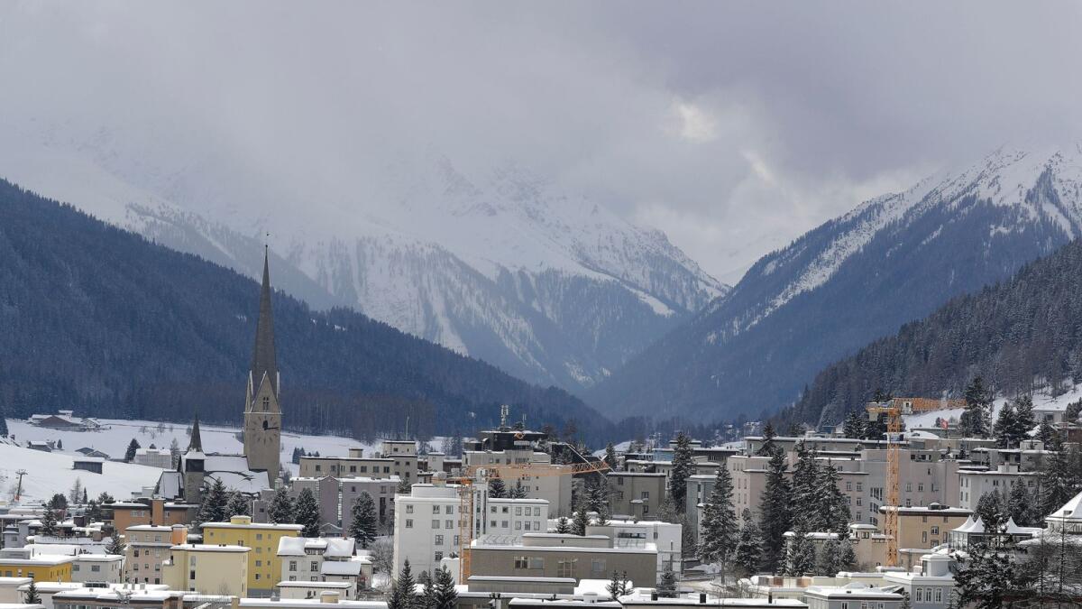 Snow covers the hills around Davos, Switzerland. This year, there are no helicopters patrolling the skies, no protesters trying to outwit security forces sealing off the Alpine resort, no Greta Thunberg stealing the show from former U.S. president Donald Trump. — AP file