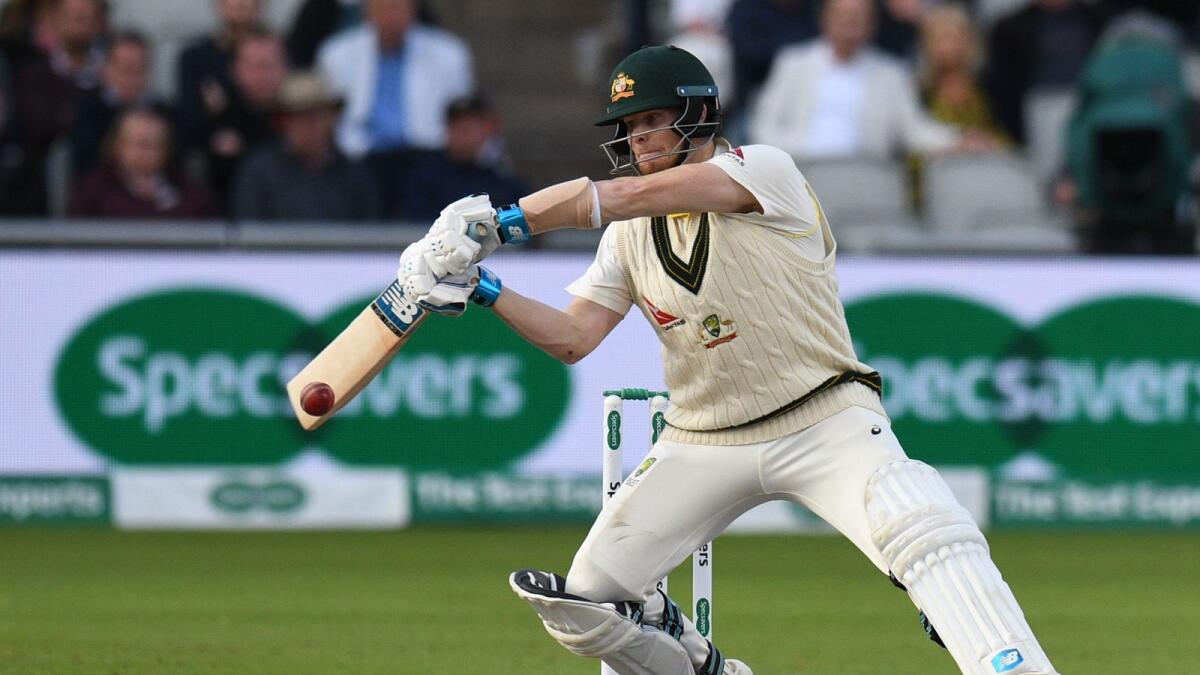 Steve Smith is struggling with an elbow injury after changing his batting grip. — AFP file