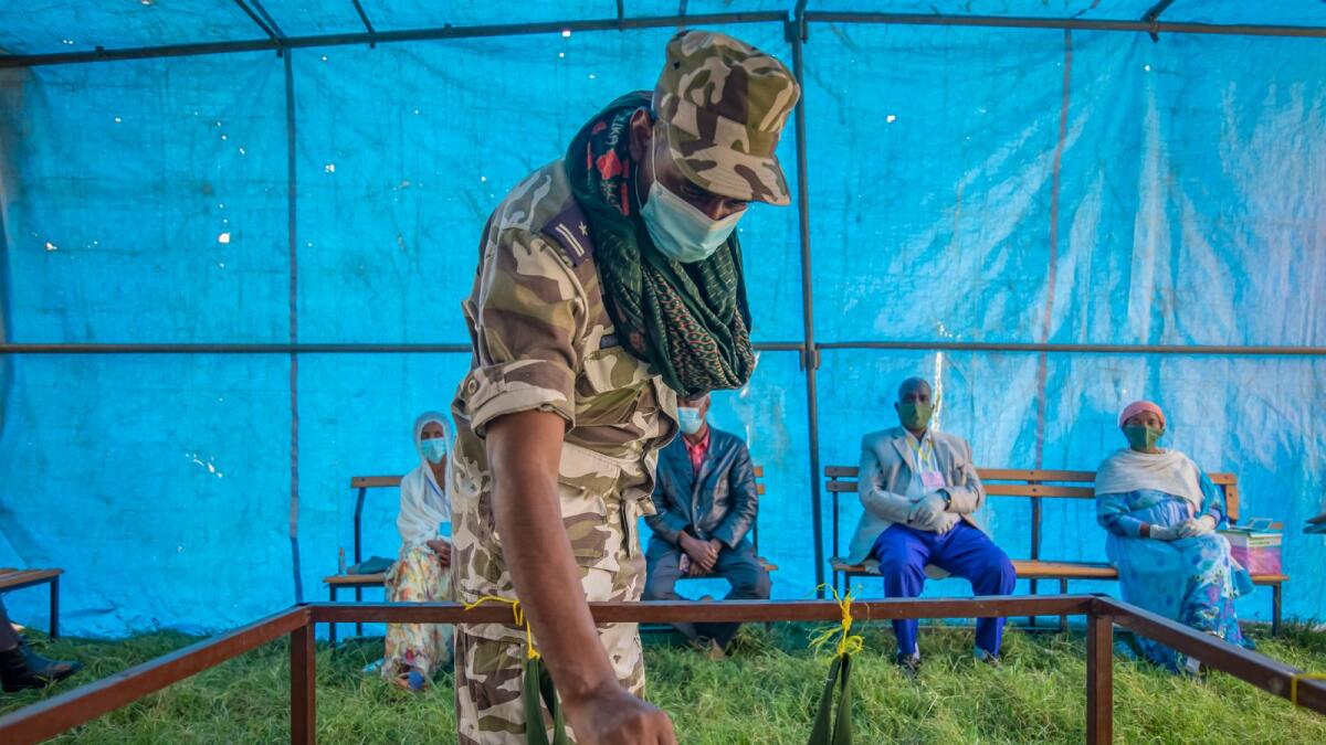 A member of Tigray Special Forces casts his vote in a local election in the regional capital Mekelle, in the Tigray region of Ethiopia.