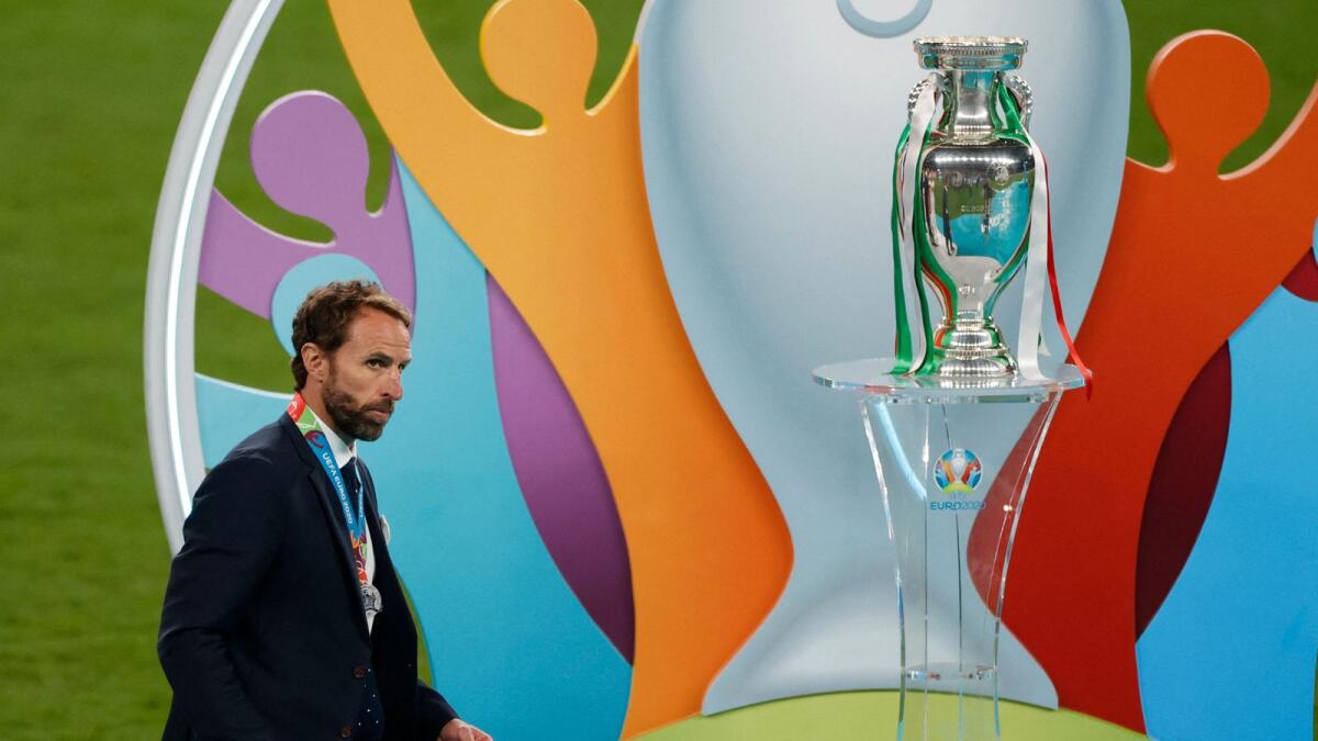 England's coach Gareth Southgate walks past the European Championship trophy after Italy won the final. — AFP