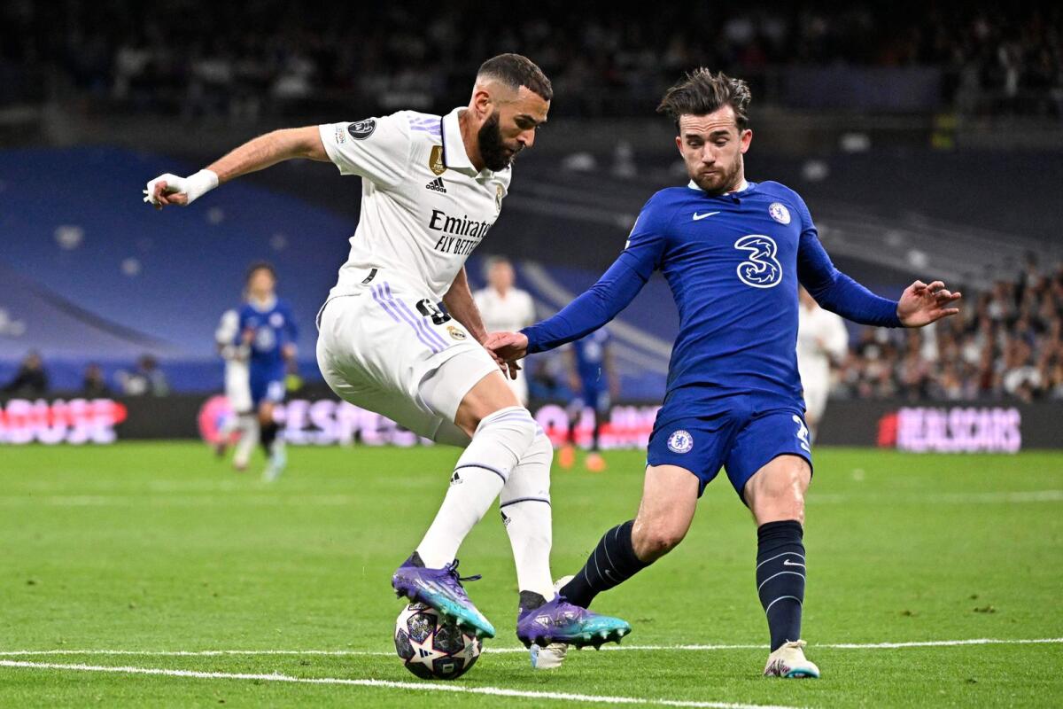 Real Madrid's Karim Benzema (left) vies with Chelsea's Ben Chilwell during the  Champions League match. — AFP
