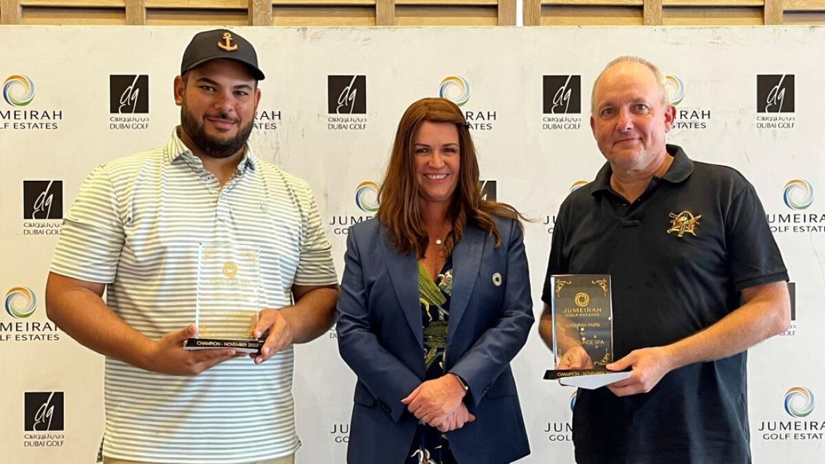 Winners of the Jumeirah Pairs by The Lounge Spa, Richard Aybar (left) and Chris Wilmot (right) with Jumeirah Golf Estates Ladies Captain, Evelyn Downham (centre). - Supplied photo