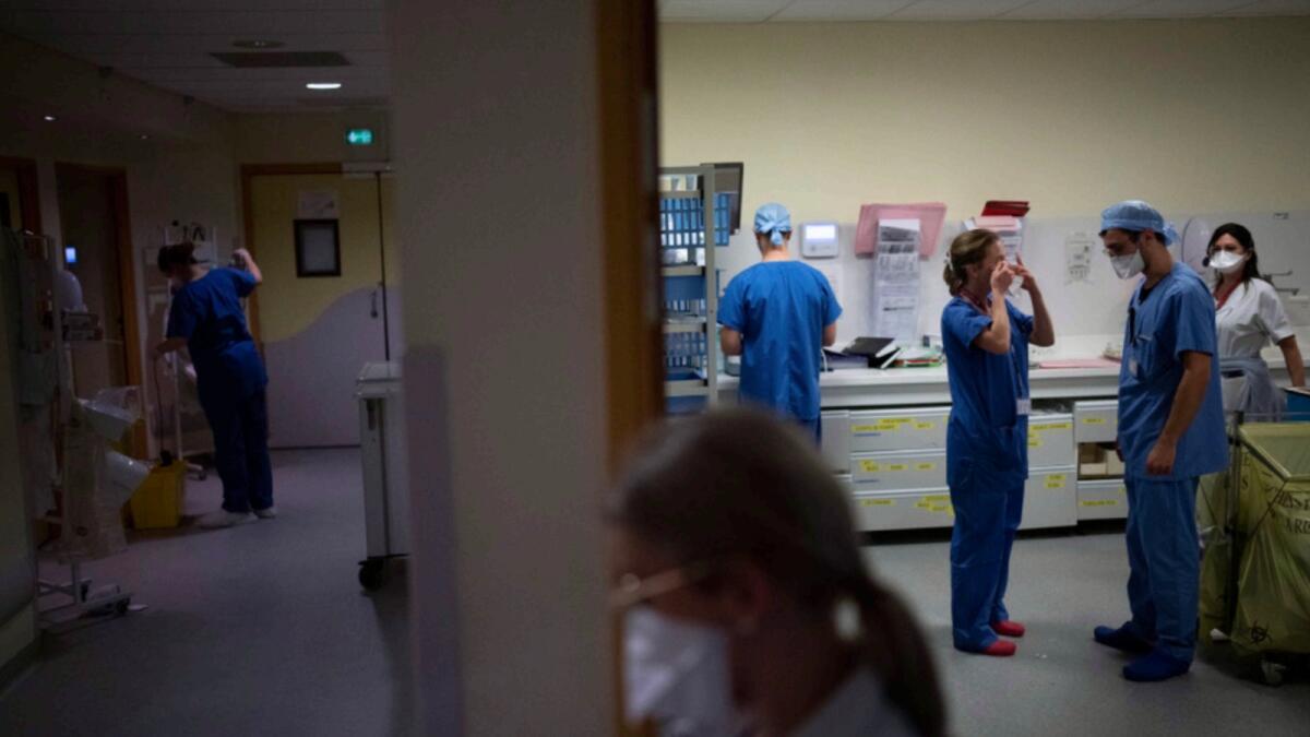 Medical workers are pictured in the Covid-19 intensive care unit at the la Timone hospital in Marseille, southern France. — AP