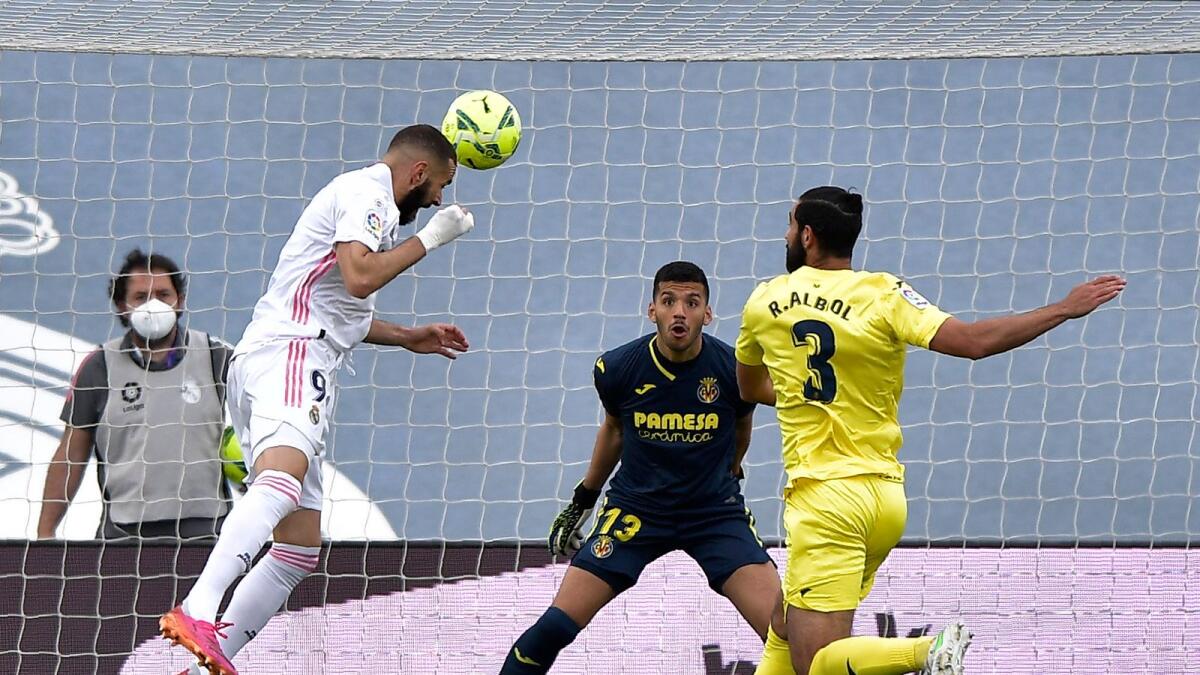 Real Madrid's Karim Benzema scores a goal disallowed for offside during the Spanish La Liga last round match against Villarreal.— AP