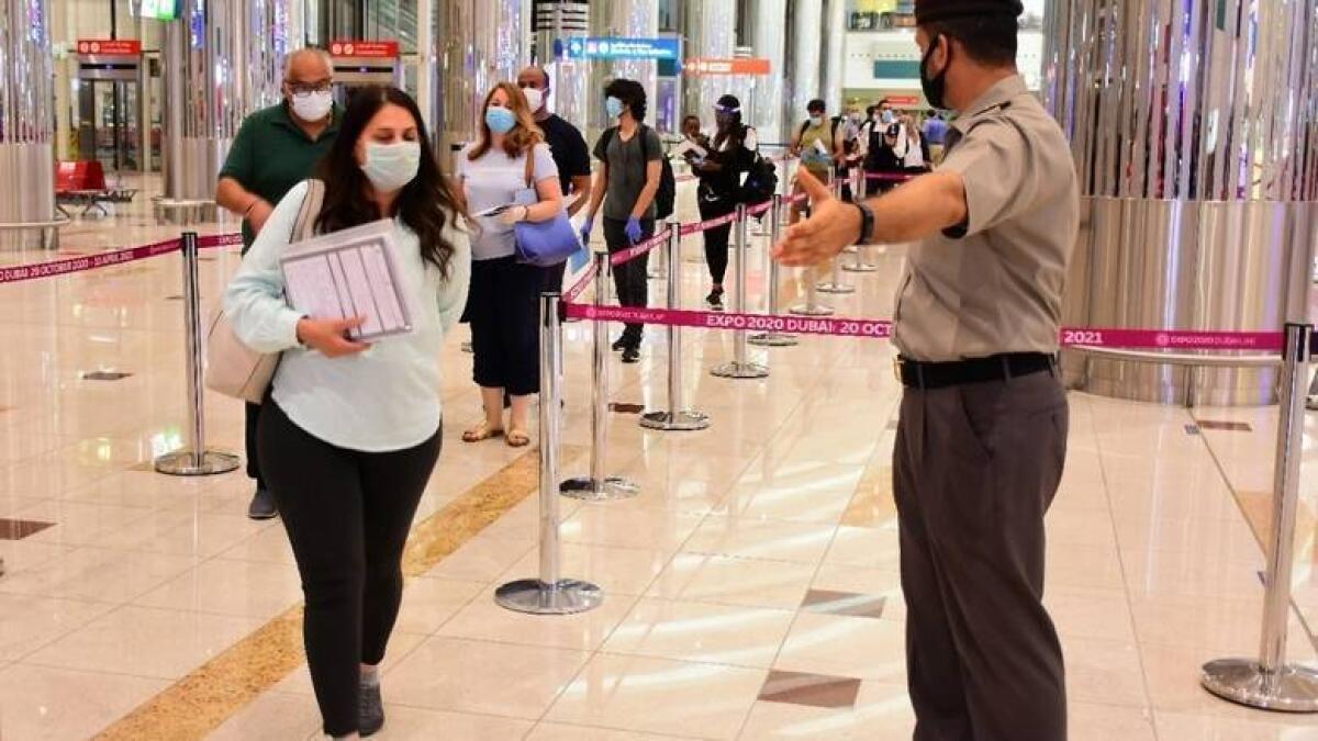 Dubai, coronavirus pandemic, Covid-19 PCR test, Dubai Immigration, visa, Travellers, dubai airport, covid-19 test 