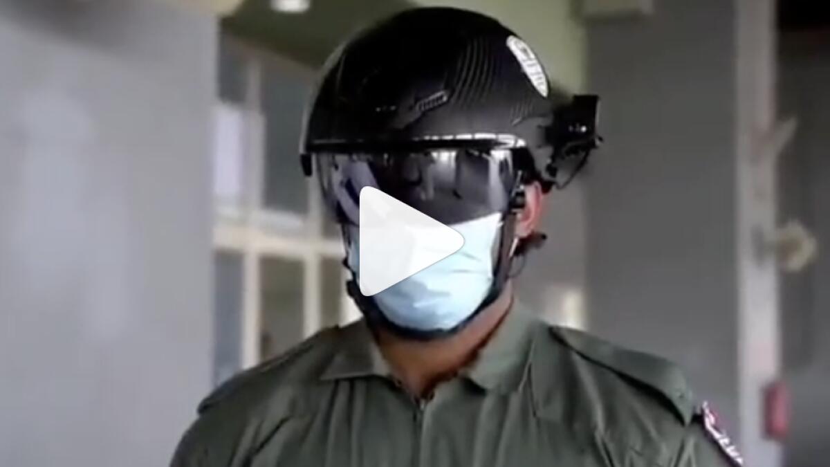 dubai police, uae fights coronavirus, covid19 pandemic, smart helmet, thermal camera