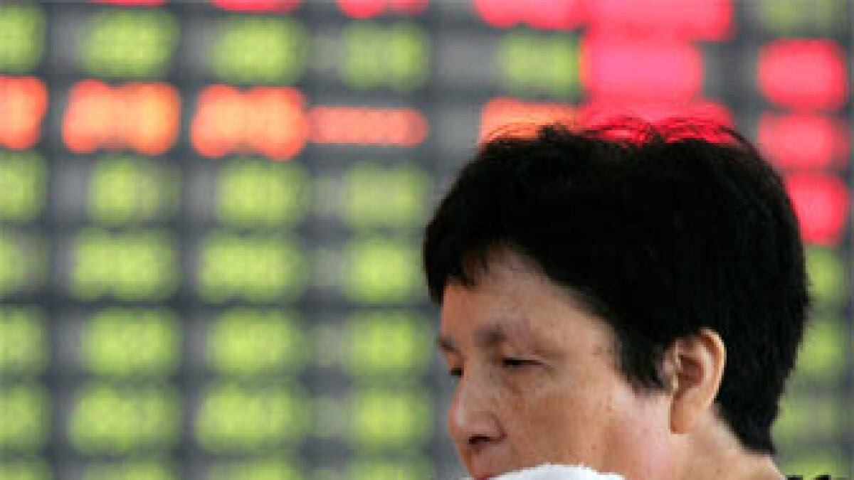 Global stocks up as China growth slows