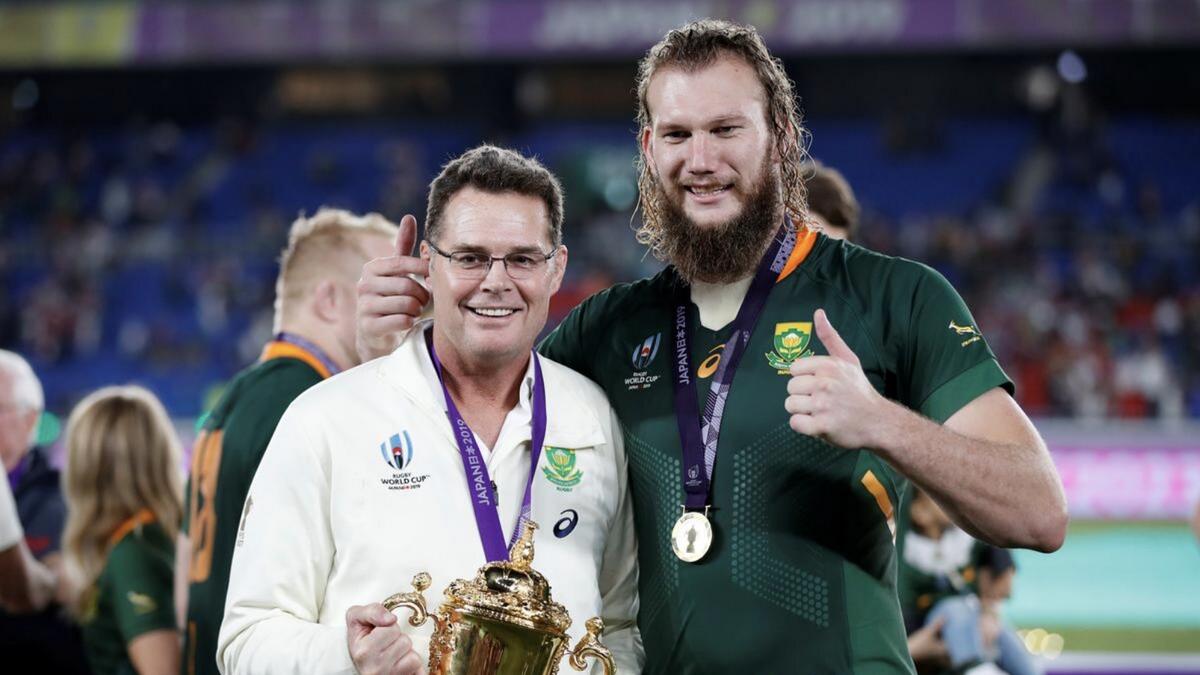 South Africa head coach Rassie Erasmus and RG Snyman pose with the Webb Ellis Cup as they celebrate winning the World Cup final. - Reuters file