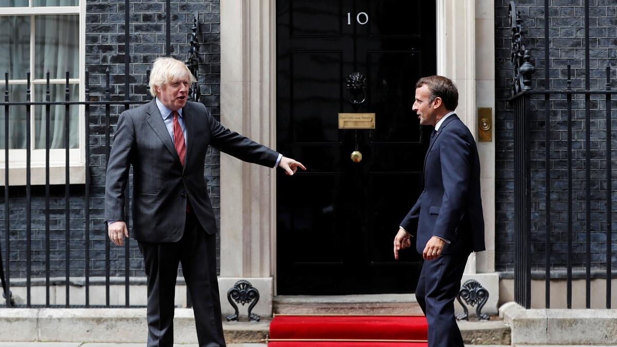 British Prime Minister Boris Johnson meets French President Emmanuel Macron at Downing Street in London, Britain, June 18, 2020.