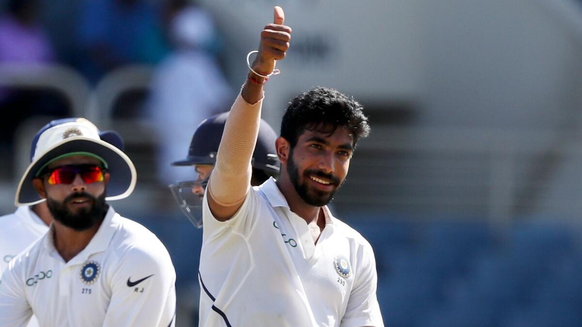 Indian fast bowler Jasprit Bumrah celebrates a wicket. (AP)