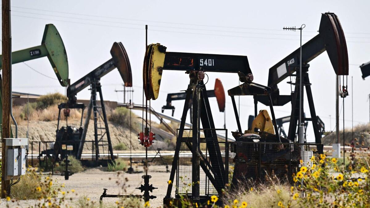 Oil pumpjacks dot the landscape on oilfields on the outskirts of Taft, Kern County, California. — AFP